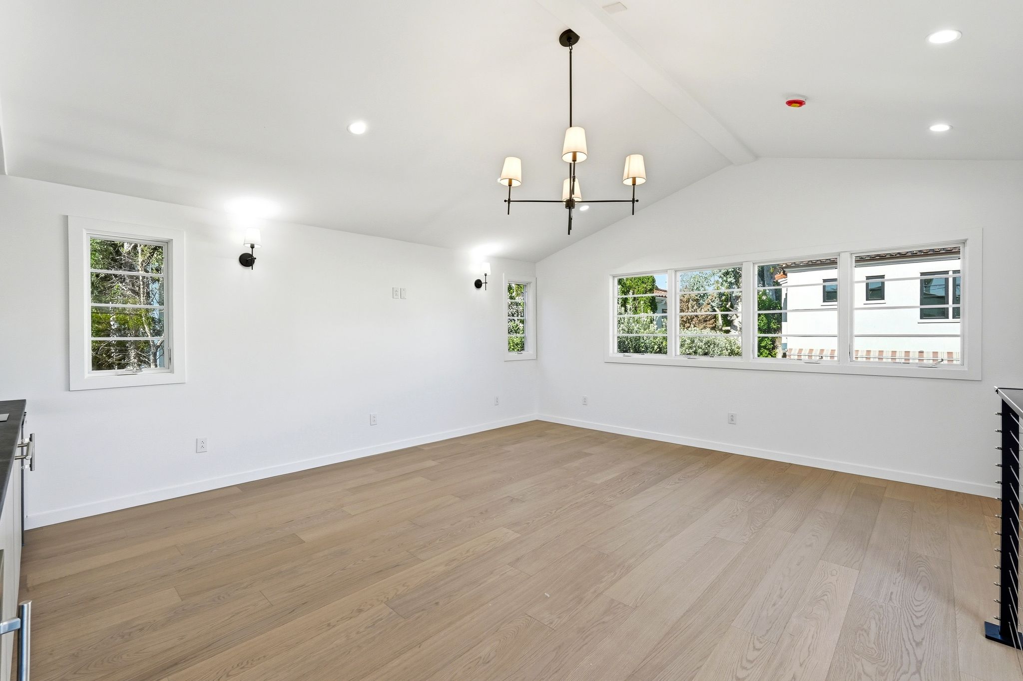 San Vincente ADU completed room view with modern trim flooring and natural light